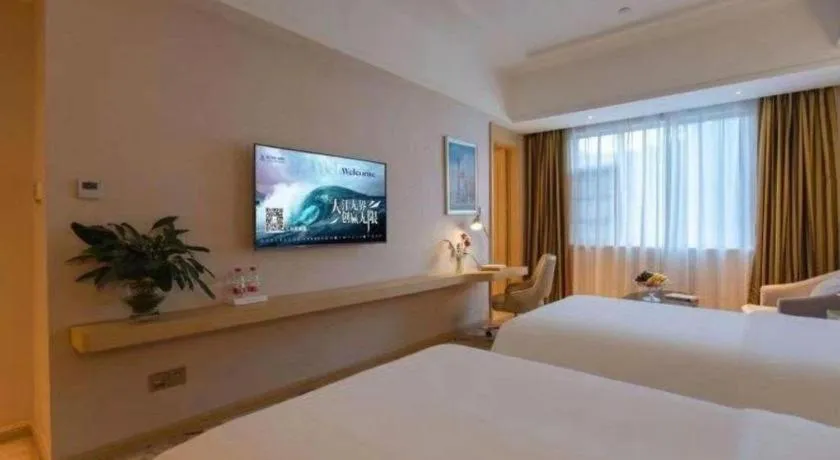 Bed in Vienna Hotel Yunnan Lijiang Ancient City