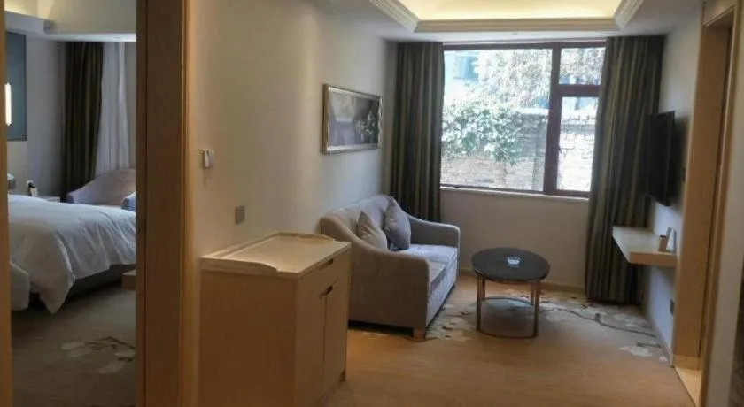 Bed in Vienna Hotel Yunnan Lijiang Ancient City