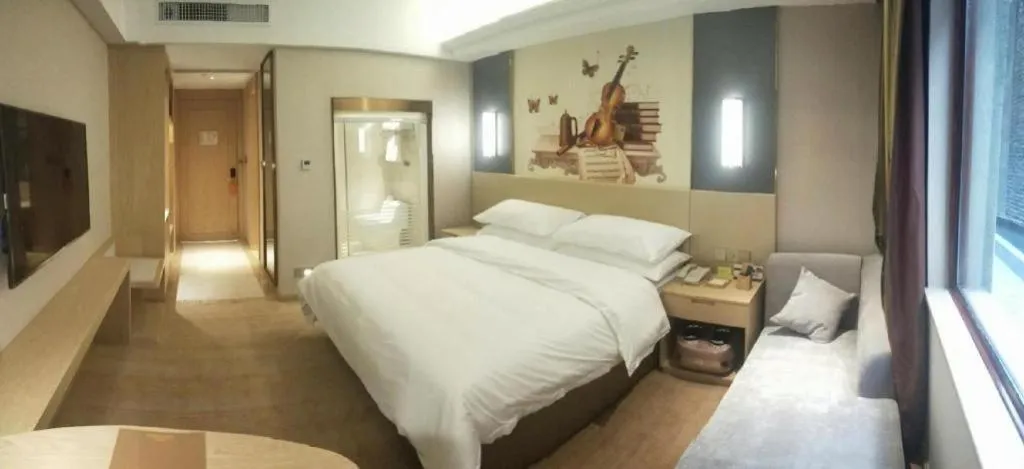 Bed in Vienna Hotel Yunnan Lijiang Ancient City