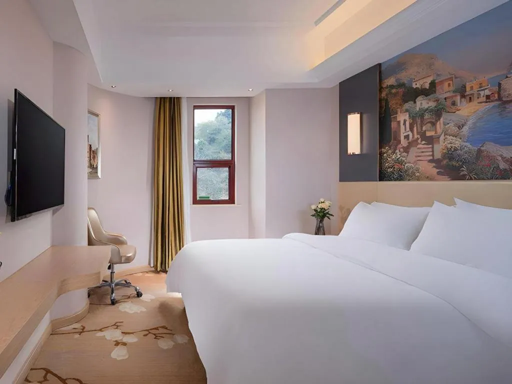 Bed in Vienna Hotel Yunnan Lijiang Ancient City