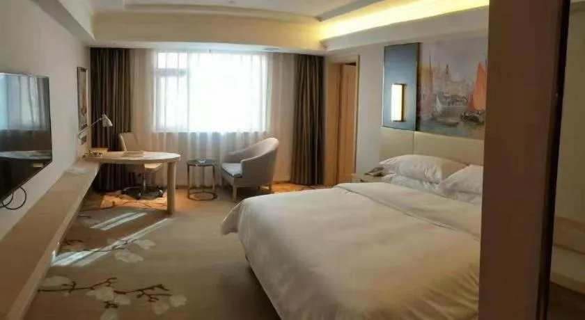 Bed in Vienna Hotel Yunnan Lijiang Ancient City