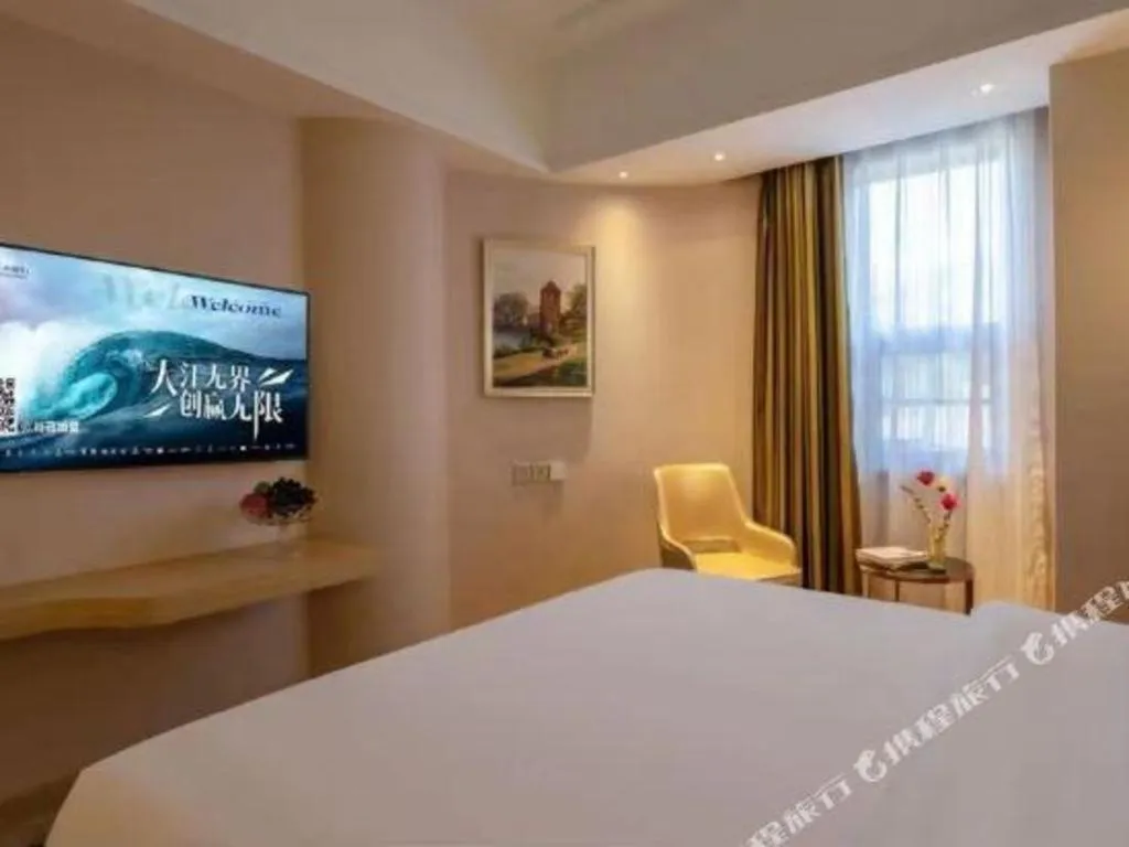 Bed in Vienna Hotel Yunnan Lijiang Ancient City