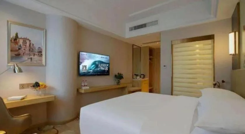 Bed in Vienna Hotel Yunnan Lijiang Ancient City