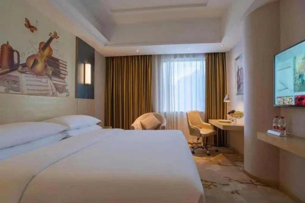 Bed in Vienna Hotel Yunnan Lijiang Ancient City