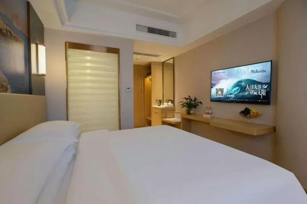 Bed in Vienna Hotel Yunnan Lijiang Ancient City