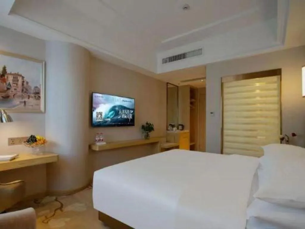 Bed in Vienna Hotel Yunnan Lijiang Ancient City