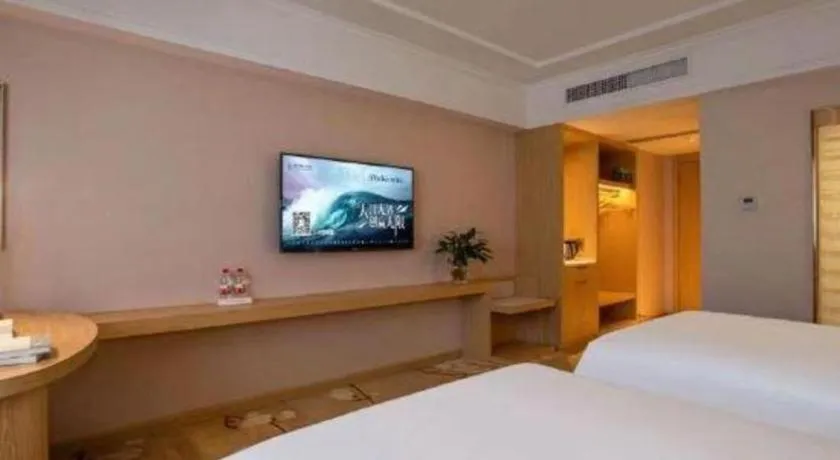 Bed in Vienna Hotel Yunnan Lijiang Ancient City