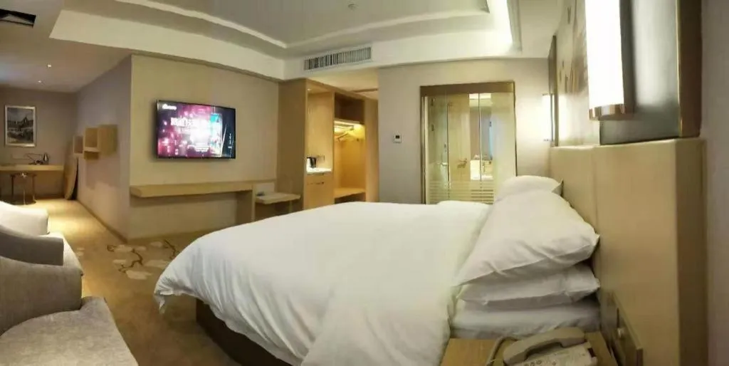 Bed in Vienna Hotel Yunnan Lijiang Ancient City