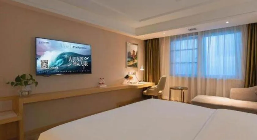 Bed in Vienna Hotel Yunnan Lijiang Ancient City