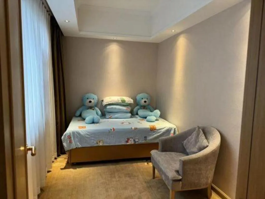 Bed in Vienna Hotel Yunnan Lijiang Ancient City