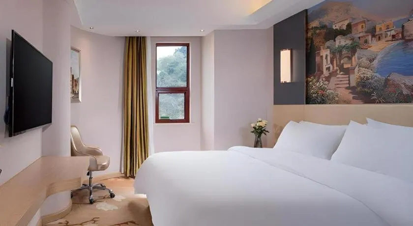 Bed in Vienna Hotel Yunnan Lijiang Ancient City