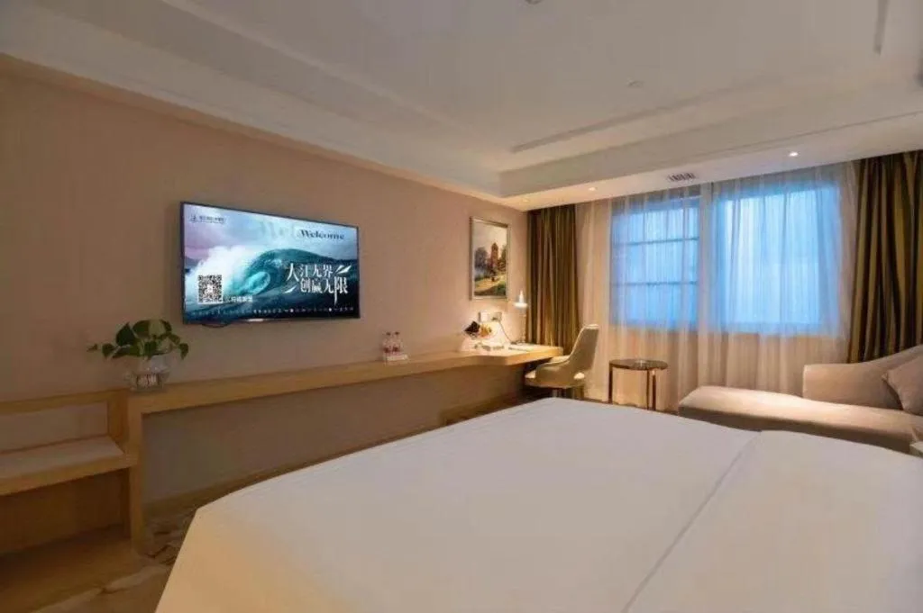 Bed in Vienna Hotel Yunnan Lijiang Ancient City