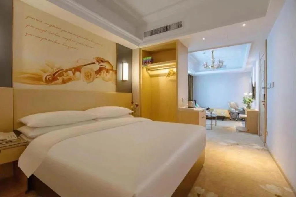 Bed in Vienna Hotel Yunnan Lijiang Ancient City