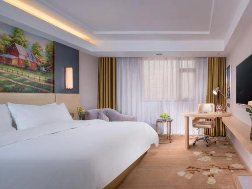 Bed in Vienna Hotel Yunnan Lijiang Ancient City