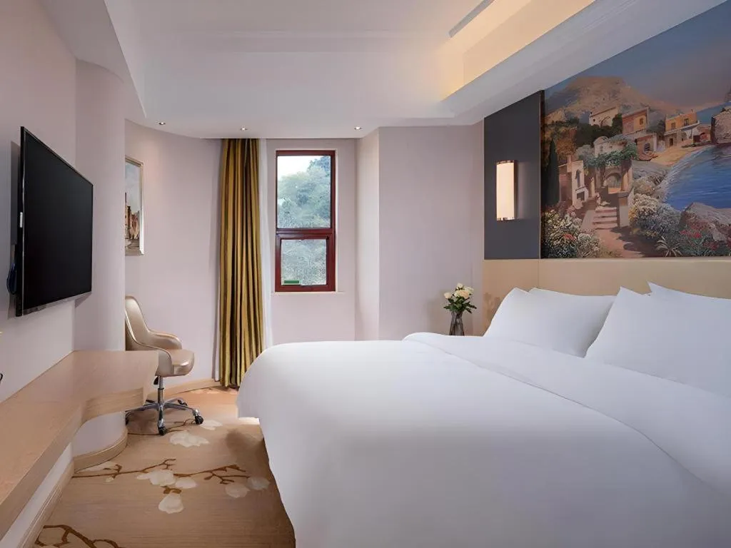 Bed in Vienna Hotel Yunnan Lijiang Ancient City