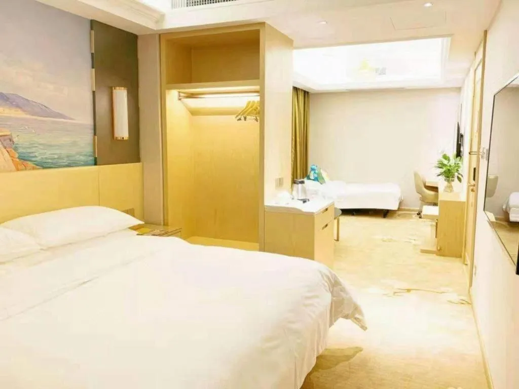 Bed in Vienna Hotel Yunnan Lijiang Ancient City