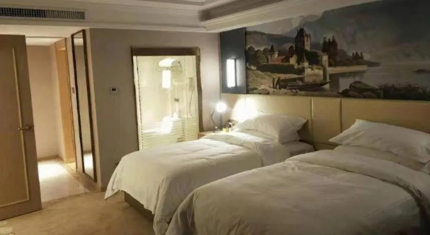 Bed in Vienna Hotel Yunnan Lijiang Ancient City