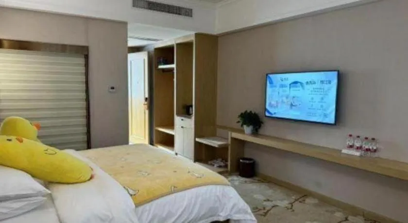 Bed in Vienna Hotel Yunnan Lijiang Ancient City