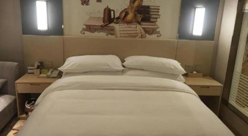 Bed in Vienna Hotel Yunnan Lijiang Ancient City
