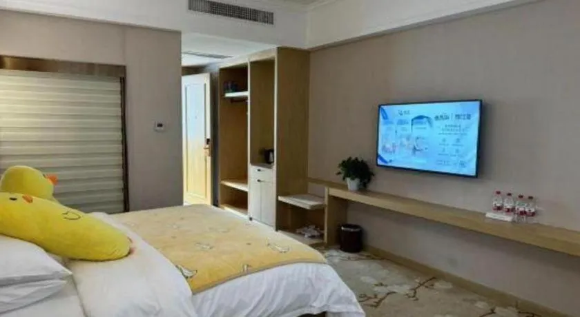 Bed in Vienna Hotel Yunnan Lijiang Ancient City