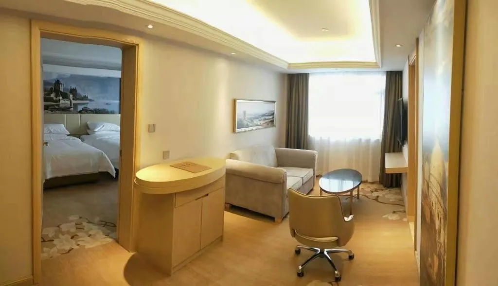 Bed in Vienna Hotel Yunnan Lijiang Ancient City