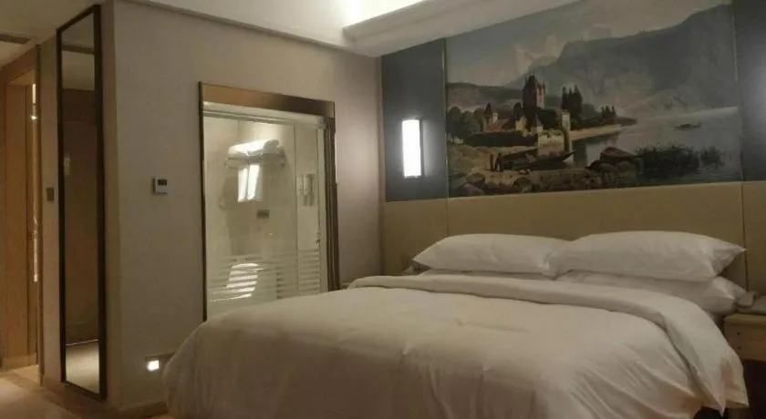 Bed in Vienna Hotel Yunnan Lijiang Ancient City