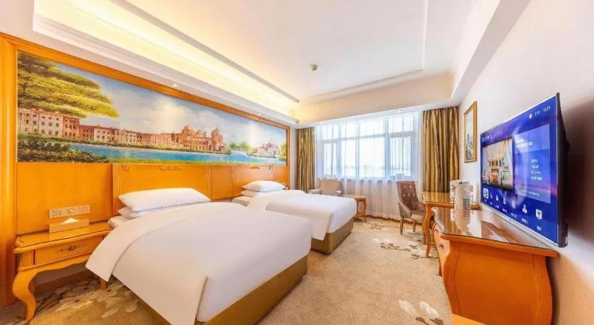 Bed in Vienna Hotel Qinghai Dachaidan