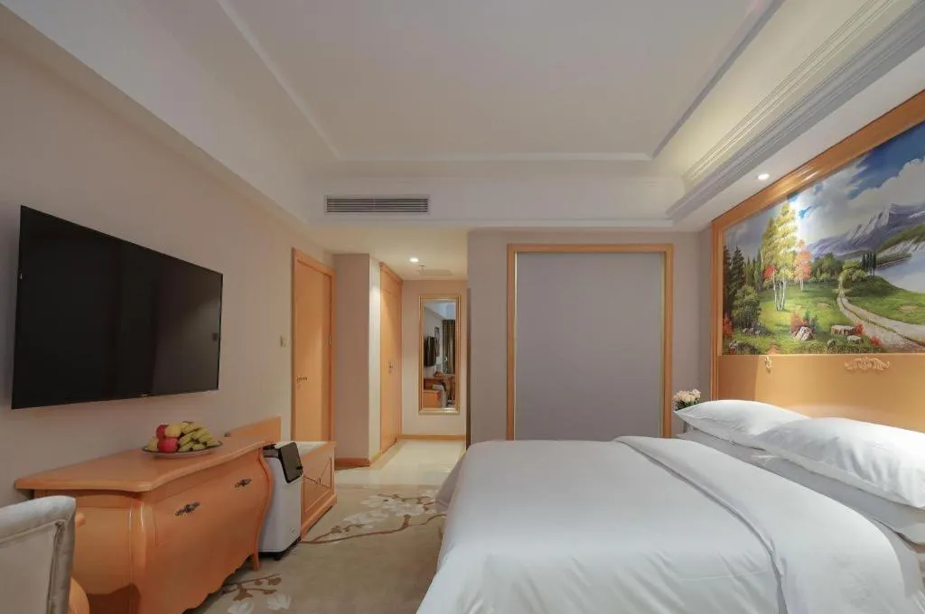 Bed in Vienna Hotel Qinghai Dachaidan