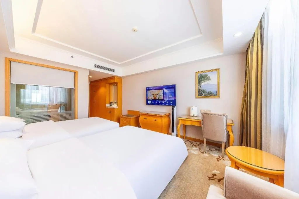 Bed in Vienna Hotel Qinghai Dachaidan