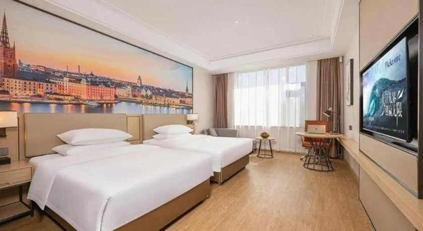 Bed in Vienna Hotel Qinghai Dachaidan