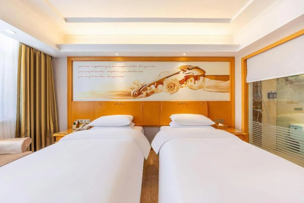 Bed in Vienna Hotel Qinghai Dachaidan