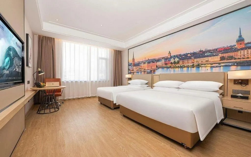 Bed in Vienna Hotel Qinghai Dachaidan