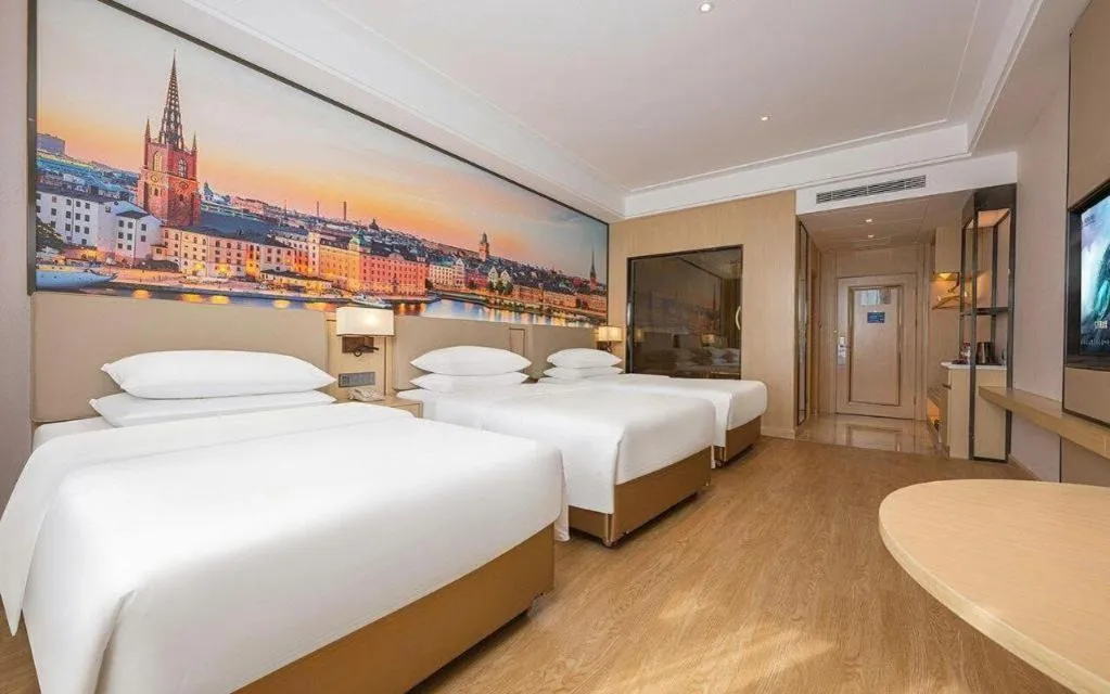 Bed in Vienna Hotel Qinghai Dachaidan