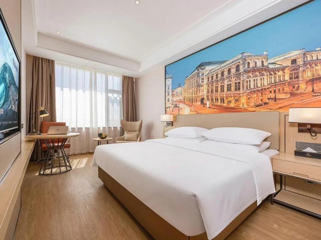 Bed in Vienna Hotel Qinghai Dachaidan