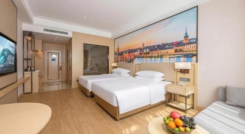 Bed in Vienna Hotel Qinghai Dachaidan