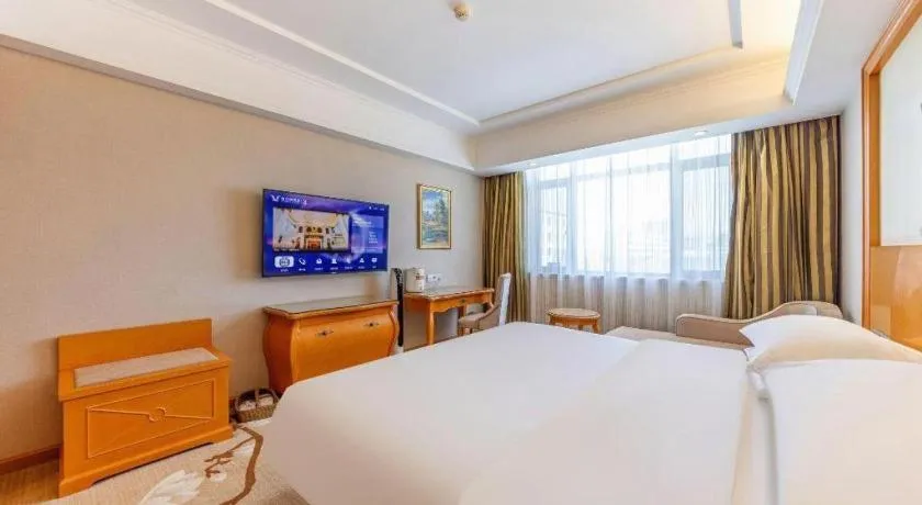 Bed in Vienna Hotel Qinghai Dachaidan