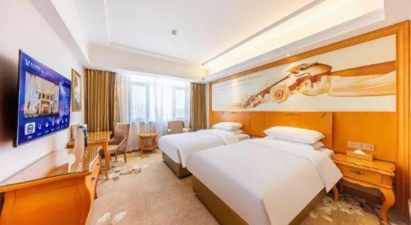 Bed in Vienna Hotel Qinghai Dachaidan