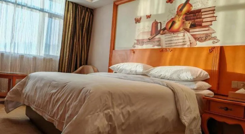 Bed in Vienna Hotel Qinghai Dachaidan