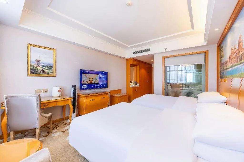 Bed in Vienna Hotel Qinghai Dachaidan