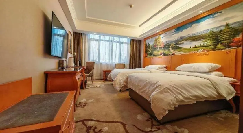 Bed in Vienna Hotel Qinghai Dachaidan