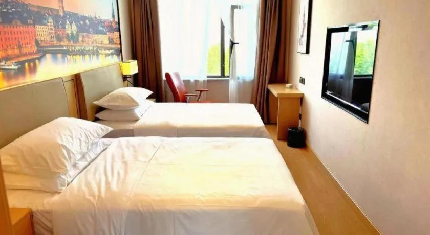 Bed in Vienna Hotel Qinghai Dachaidan