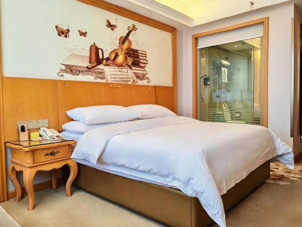 Bed in Vienna Hotel Qinghai Dachaidan