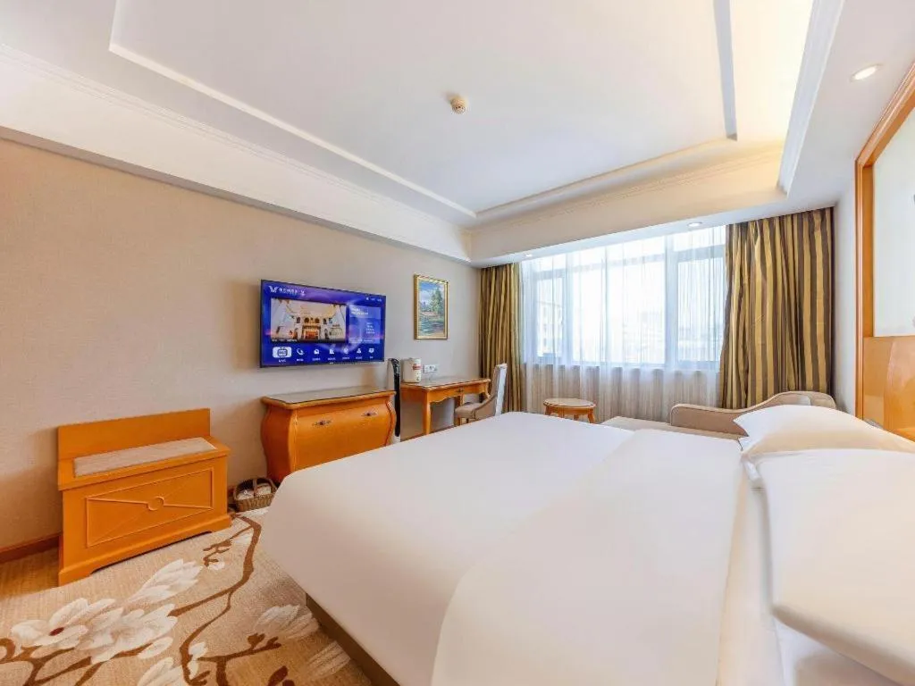 Bed in Vienna Hotel Qinghai Dachaidan