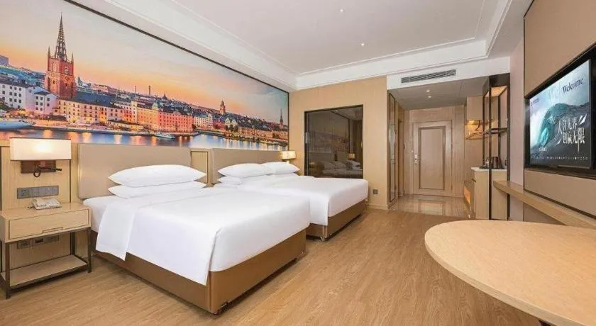 Bed in Vienna Hotel Qinghai Dachaidan