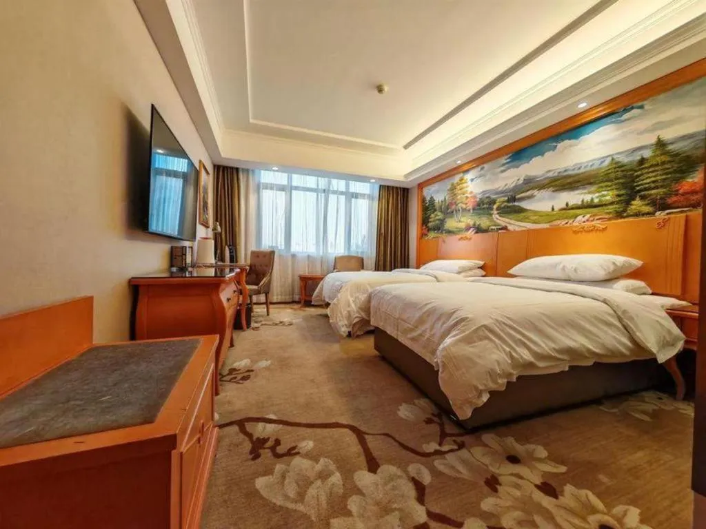 Bed in Vienna Hotel Qinghai Dachaidan