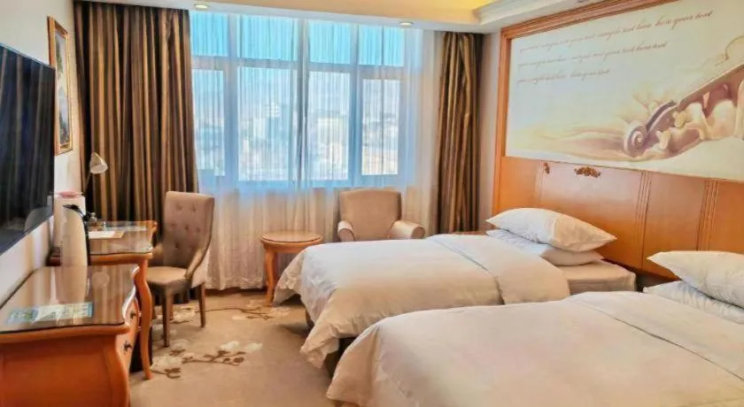 Bed in Vienna Hotel Qinghai Dachaidan