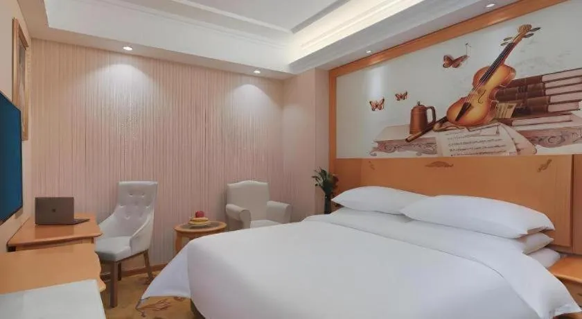 Bed in Vienna Hotel Hebei Cangzhou Mingzhu Market