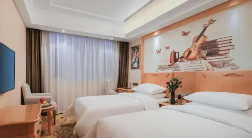 Bed in Vienna Hotel Hebei Cangzhou Mingzhu Market