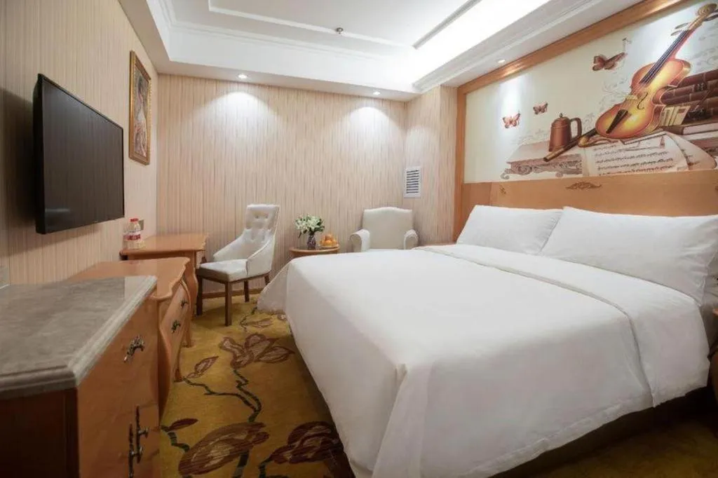 Bed in Vienna Hotel Hebei Cangzhou Mingzhu Market