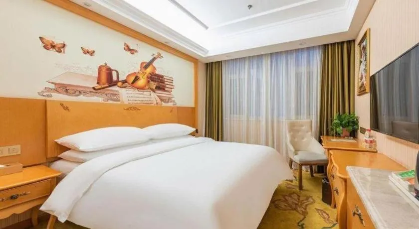 Bed in Vienna Hotel Hebei Cangzhou Mingzhu Market